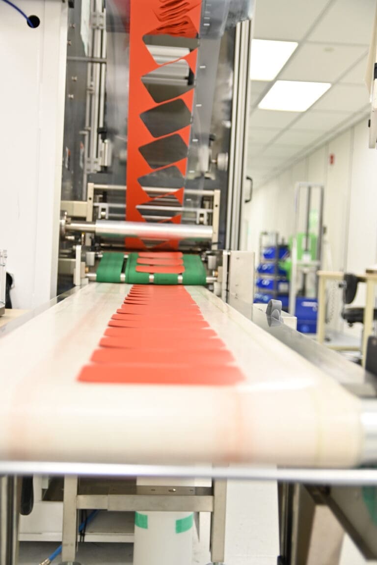 kent displays contract roll to part manufacturing